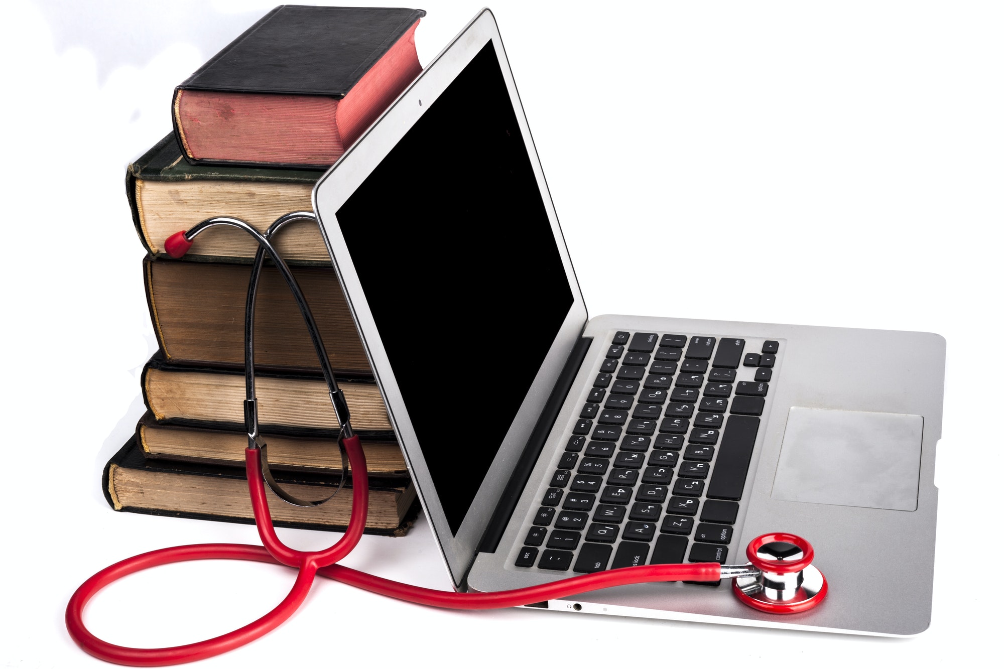 Red Stethoscope and Laptop
